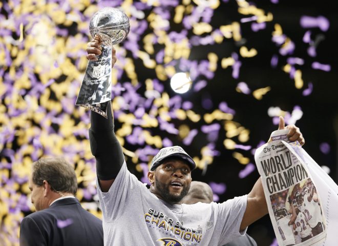 Baltimore Ravens linebacker Ray Lewis holds the Lombardi trophy