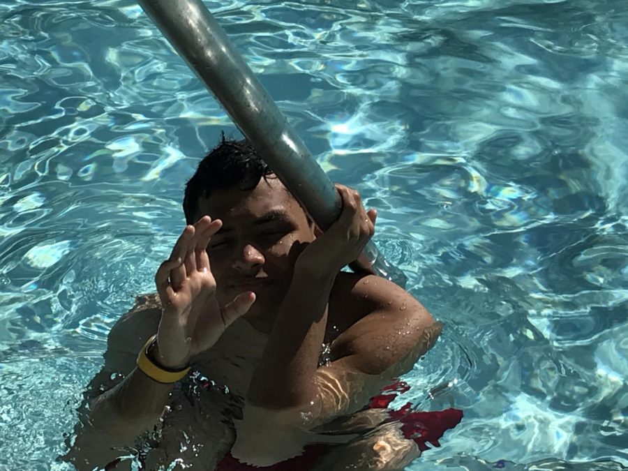 Carlos in the pool.  Not pictured--hundreds of weights needed to even out the swimming field.