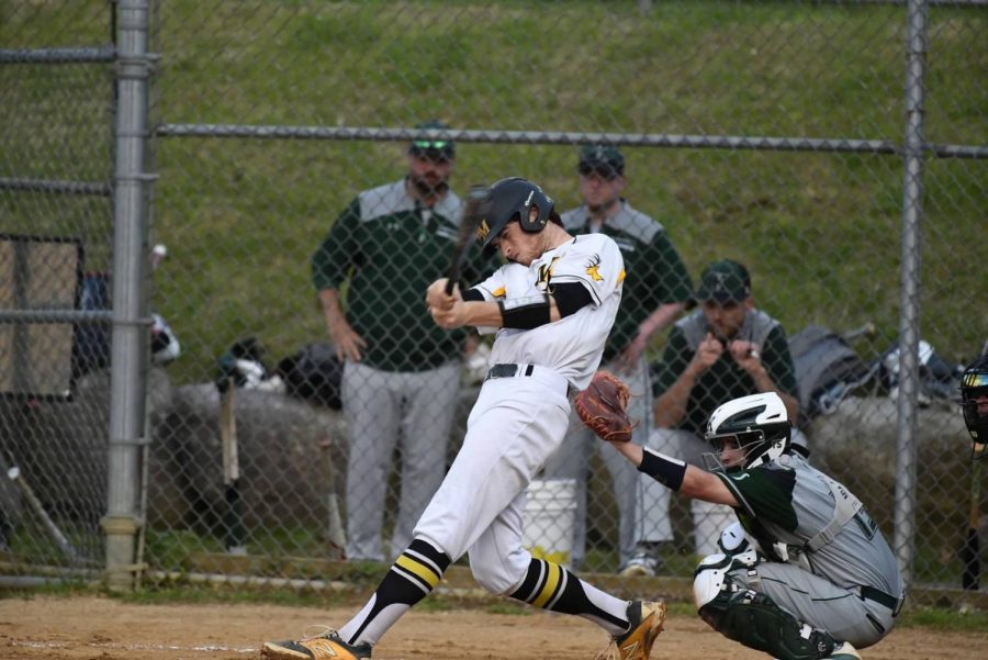 Brandon Licursi taking a big swing against Kinnelon. Photo courtesy: Kristen Milko