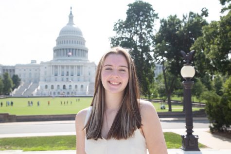 Brown poses for a picture in front of the US Capitol Building