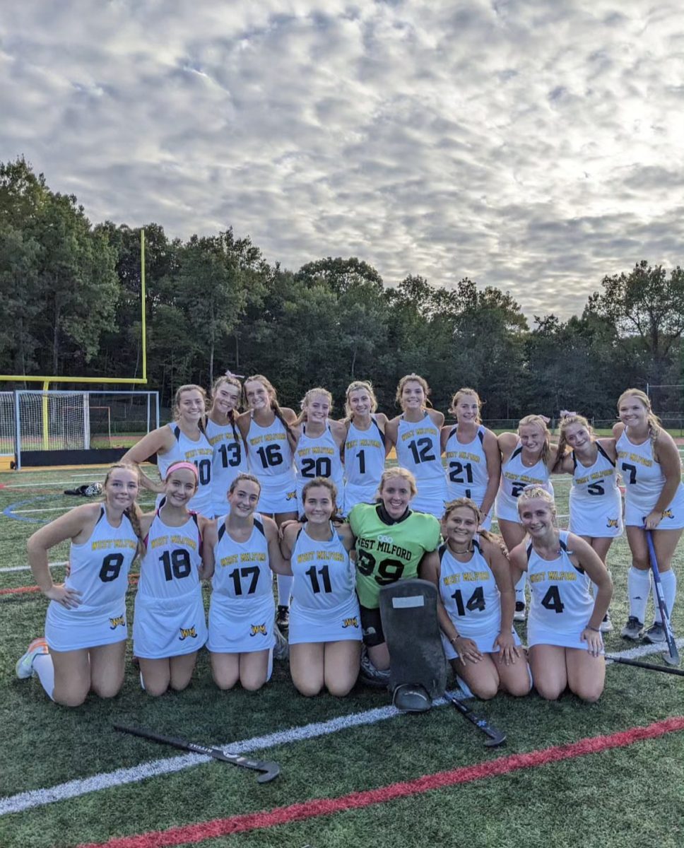 The Highlander Field Hockey Team gathers around for a picture after a 7-0 win vs. Passaic Valley on 9/27/23.  