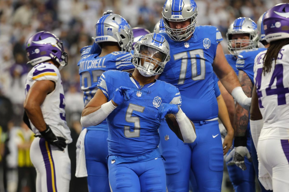 Lions+running+back+David+Montgomery+celebrates+after+scoring+a+touchdown+during+a+game+in+Minnesota+vs.+the+Vikings.