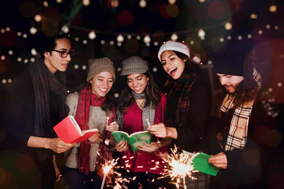 People caroling on a winter night