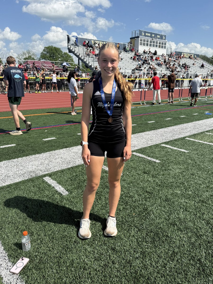 Ciara with one of her many medals after a race. Photo via WMHS Girls Track on X.